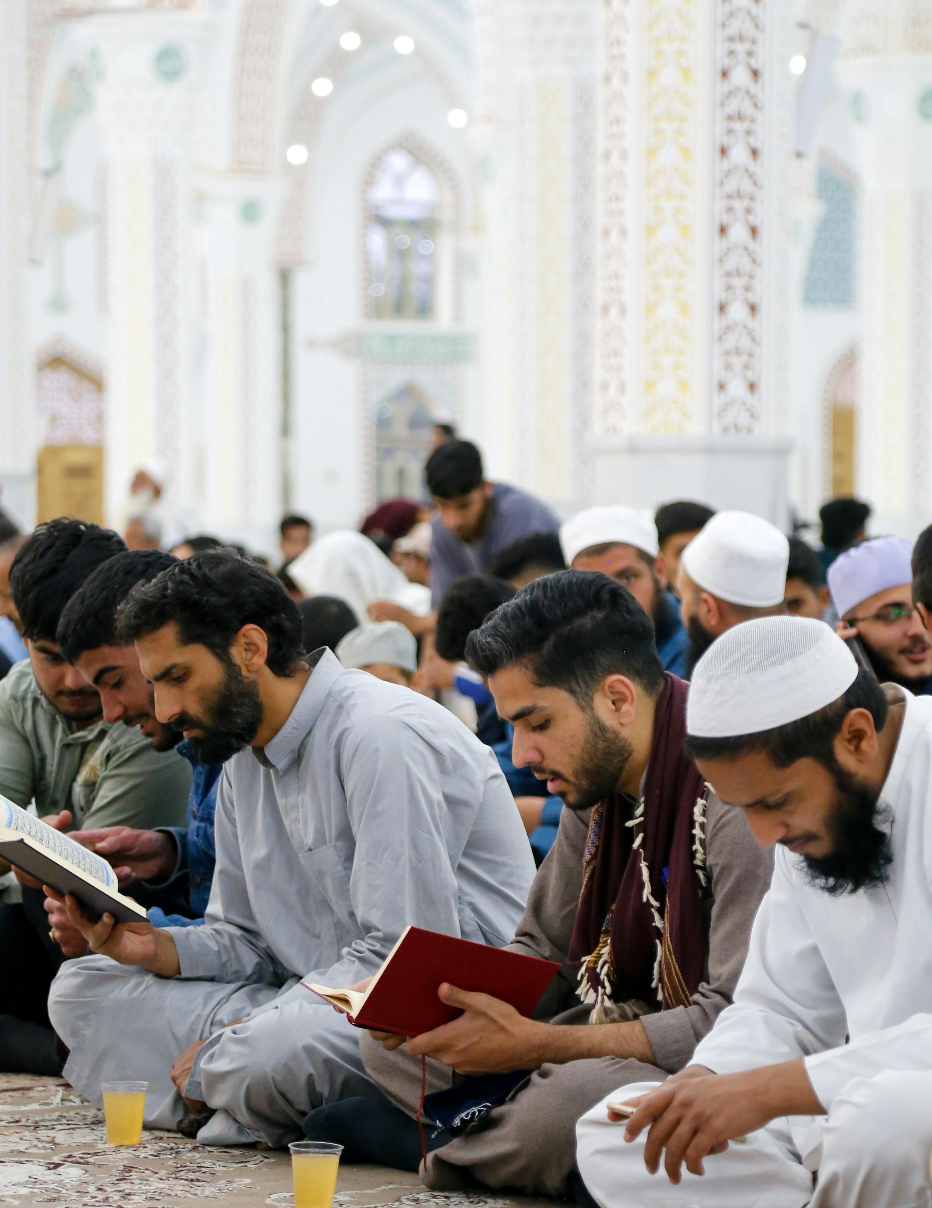 People reading together in a gathering